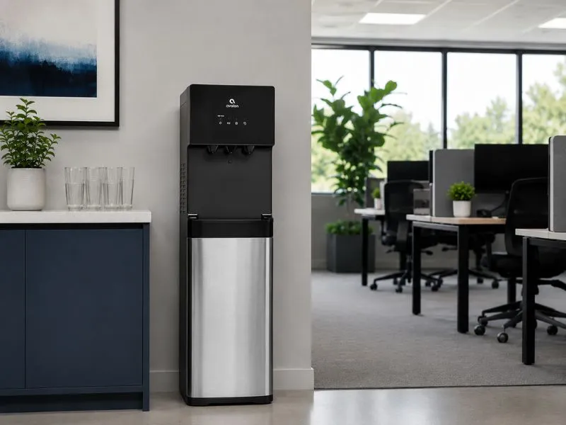 Freestanding bottleless water cooler in an office break room